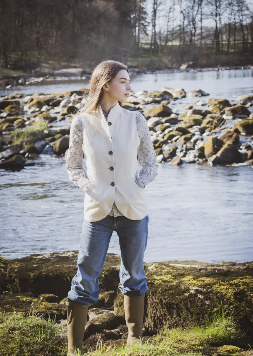 Bella' gilet in Ivory herringbone linen with slate spot lining